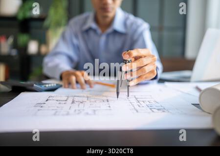 Architecture Man drawing on architectural Creative project business architecture building construction Industrial engineering Ac Stock Photo