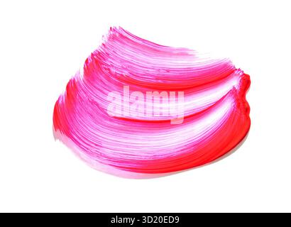 Vibrant red and pink paint brushstroke on white background showing dynamic Stock Photo