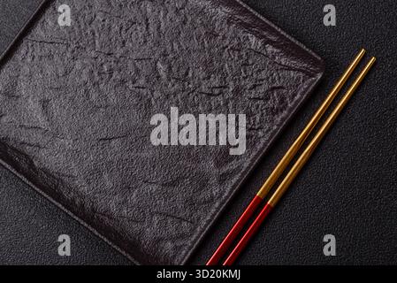 An empty plate with chopsticks for Japanese or Chinese food Stock Photo