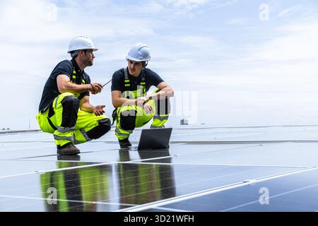 Professional Engineer Service Solar Panel. Worker Maintenance Cleaning Replacing Solar Panel. Solar photovoltaic panel system in Industry roof. Saving Stock Photo