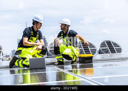 Professional Engineer Service Solar Panel. Worker Maintenance Cleaning Replacing Solar Panel. Solar photovoltaic panel system in Industry roof. Saving Stock Photo