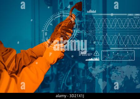 Electrician worker checking repair maintenance fix service electric system. engineer testing electric cable at main power line cabinet fuse box. Stock Photo