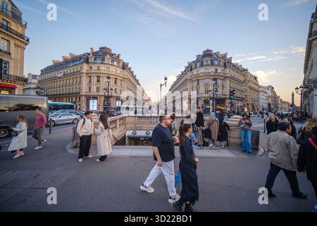 Paris, France - October 11, 2025 : View of the very busy Auber train station entrance and the beautiful boulevards of Paris France in the background Stock Photo
