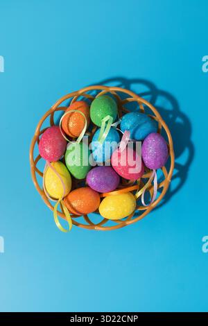 Collection of decorative and colorful Easter eggs on a blue background. Easter card. Stock Photo