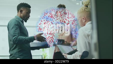 Collaborating three business professionals analyzing data globe in meeting room, with laptop tablet Stock Photo