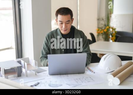 Architecture Man drawing on architectural Creative project business architecture building construction Industrial engineering A Stock Photo