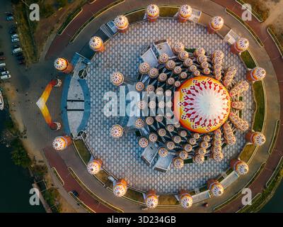 Aerial view of colorful geometric patterns on a large dome structure with surrounding columns. 99 Domes Mosque, Makassar, South Sulawesi, Indonesia Stock Photo