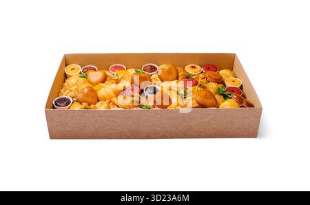 Assorted pastries displayed in a box for a dessert event Stock Photo