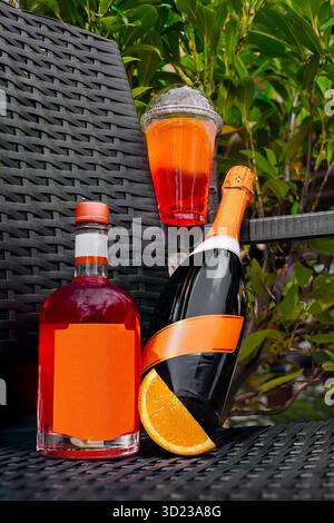 Refreshing beverages displayed in a garden setting with vibrant colors Stock Photo