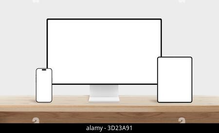 Computer monitor, smartphone, and tablet with blank screens on wooden desk, perfect for responsive web design and digital technology mockup presentati Stock Photo