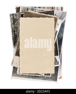 Stack old photos with blank copy space, isolated on a white background. Abstract textured backdrop, postcard mockup. Stock Photo