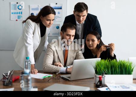 Business meeting. buiness team brainstorming while sitting at the office table together Stock Photo