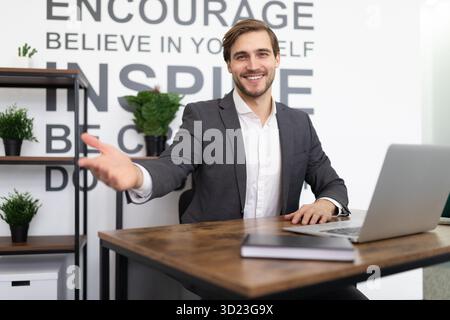 HR manager welcomes a new employee in the office Stock Photo