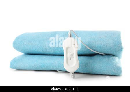 Folded electric heating pad on white background Stock Photo
