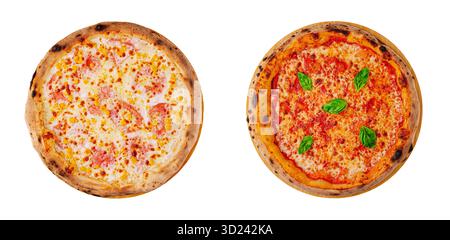 Two delicious pizzas with different toppings served on wooden plates Stock Photo