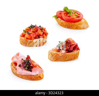 Various delicious bruschetta with toppings on toasted bread slices Stock Photo