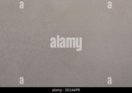 Smooth, light gray textured wall surface perfect for modern decor and background settings Stock Photo
