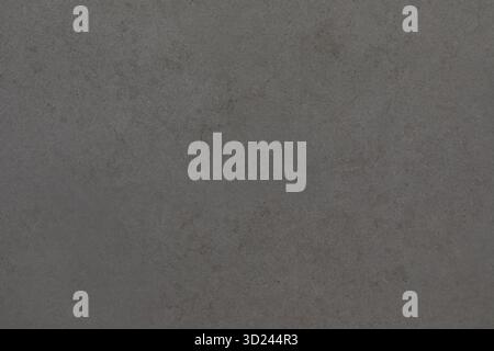 Gray concrete surface with subtle texture and patterns from different lighting conditions Stock Photo