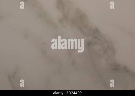 White marble surface with soft gray veining showing natural beauty and elegance Stock Photo