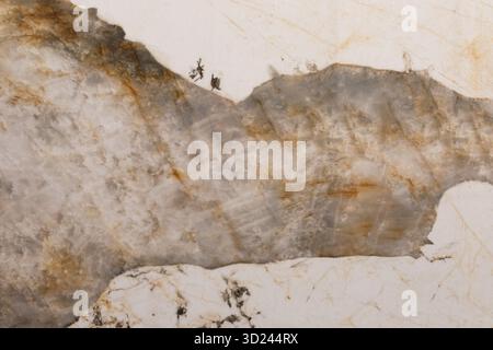 Beautiful unique patterns of natural marble stone with striking colors and textures in a close-up view Stock Photo