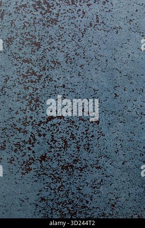 Surface with textured design featuring varying shades of blue and black, perfect for artistic backgrounds or decorative purposes Stock Photo