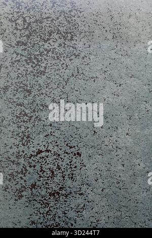 Texture of a weathered surface with blue and brown shades appearing in artistic patterns Stock Photo