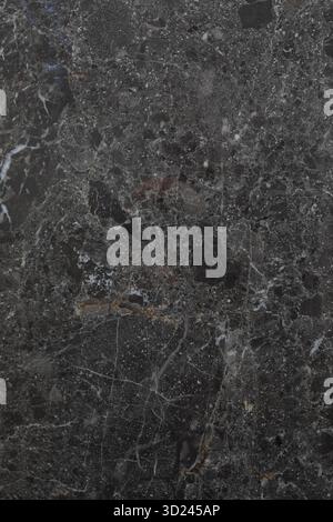 Dark marble texture with intricate veining patterns showcasing elegance and natural beauty in a stone surface Stock Photo