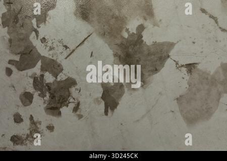 Surface with peeling material showcasing age and wear in an indoor setting Stock Photo