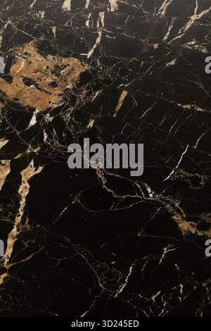 Elegant black marble with golden veins for interior design and decoration projects Stock Photo
