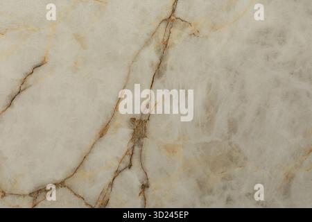 Elegant marble texture with golden veins and soft gray background suitable for interior design or artistic projects Stock Photo