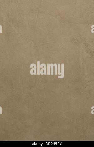 Textured surface of rustic wall showing shades of brown and beige in a warm, inviting atmosphere Stock Photo