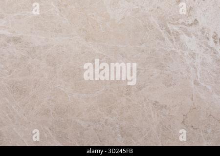 Elegant light beige marble with subtle patterns highlighting natural stone texture for decorative use Stock Photo