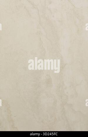 Smooth beige marble surface with subtle veins ideal for interior design and home decor projects Stock Photo