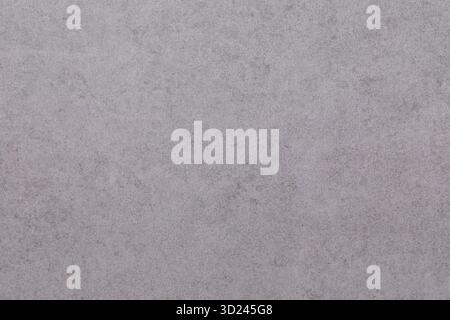 Smooth and subtle gray texture on a surface, perfect for backgrounds or minimalistic designs Stock Photo