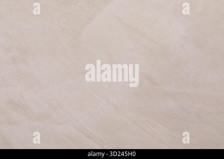 Smooth beige plaster wall with subtle texture ideal for modern interior design projects Stock Photo