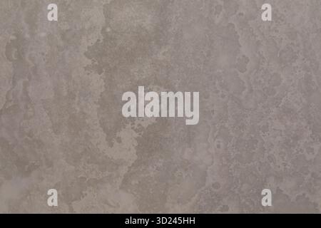 Textured surface with unique patterns and colors resembling natural stone formation Stock Photo