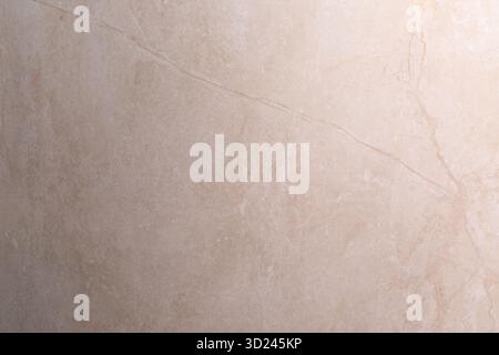 Light beige marble surface with subtle veins creating an elegant backdrop for various designs and settings Stock Photo