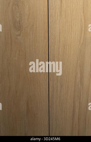 Wood grain close-up showing natural texture and color variations in light brown tones Stock Photo