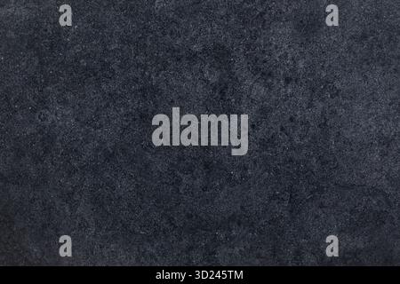 Dark textured surface with a subtle pattern creating a modern and elegant backdrop Stock Photo