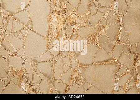 Abstract pattern of beige marble with golden veins and intricate textures perfect for design or architecture Stock Photo