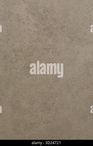 Surface texture of a natural stone with earthy colors showcasing detailed patterns and variations in a subtle design Stock Photo