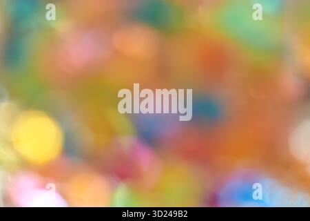 Colorful abstract bokeh background with soft blurred light for vibrant creative Stock Photo