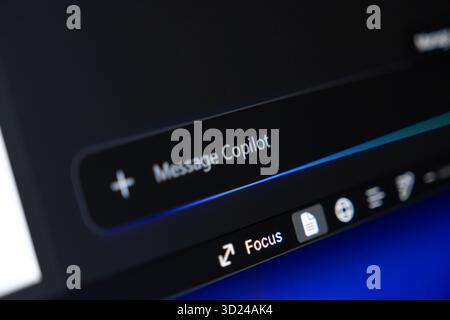 Poznan, Poland - September 18, 2025: Copilot AI application on a dark screen, showing artificial intelligence capabilities for innovative task managem Stock Photo