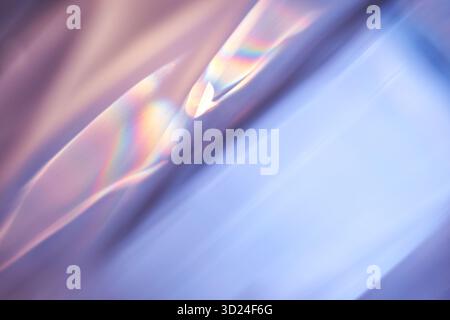 Abstract light refraction with soft pastel colors creating a playful rainbow Stock Photo