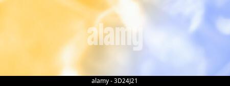 Abstract blurred background with soft yellow and blue gradient light effects Stock Photo
