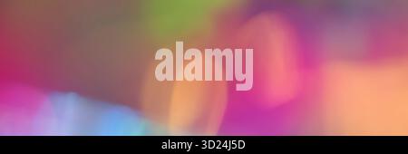 Colorful abstract blurred background in vivid gradient hues of pink, orange Stock Photo