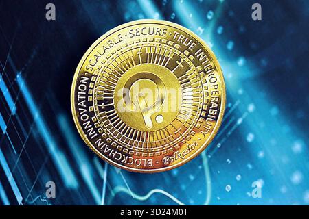 KYIV, UKRAINE - OCTOBER 9, 2025 Polkadot cryptocurrency coin sticker on blue candles chart banner. Concept of modern crypto money Stock Photo