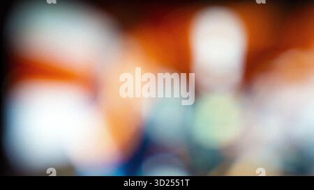 Grainy colorful blur background with orange and blue tones Stock Photo