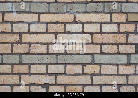 Pale yellow and beige brick wall texture Stock Photo