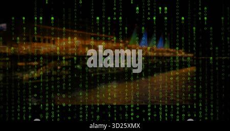 Streaming green binary code flowing across night waterfront skyline, with blurred water reflections Stock Photo